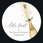 Let's Toast Couples Engagement Party Classic Round Sticker<br><div class="desc">Let's Toast Engagement Party Round sticker is perfect to seal envelopes or for your favour packaging. Designed with a beautiful watercolor Gold Champagne Bottle.  Matching items in our store Cava Party Design.</div>
