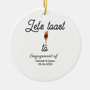 Let's toast to engagement party name date glass ceramic ornament