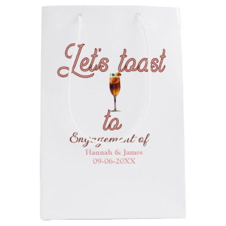 Let's toast to engagement party name date glass medium gift bag