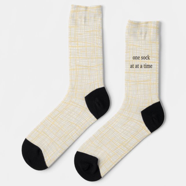 Lettering on a coarse fabric. One Sock At A Time (Left)