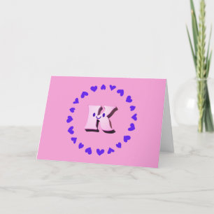 Lettre de sourire K avec carte de note de coeur