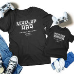 Level Up Gamer Dad Child Next Gen Player Matching Toddler T-shirt<br><div class="desc">Celebrate the ultimate gaming bond with our "Gamer Dad & Next Gen Player" matching t-shirts! Featuring retro designs "Level Up Dad" and "Next Gen Gamer, " these shirts are perfect for Father's Day, birthdays, or any gaming event. Show your shared passion with bold, pixelated graphics. Ideal for gamer dads and...</div>
