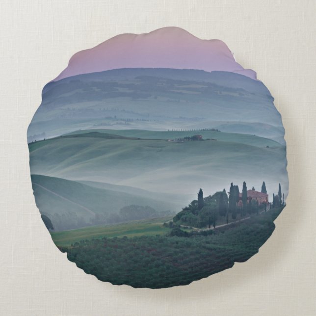 Lever de soleil rose au-dessus d'un coussin rond (Dos)