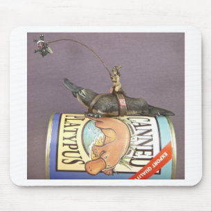 Libby on a platypus on a mousepad