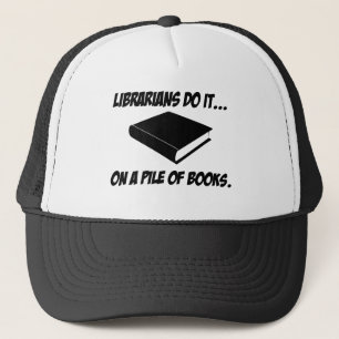 Librarians Do It... On a Pile of Books Trucker Hat