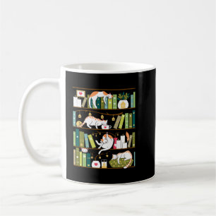 Library cats - whimsical cats on the book shelves  coffee mug