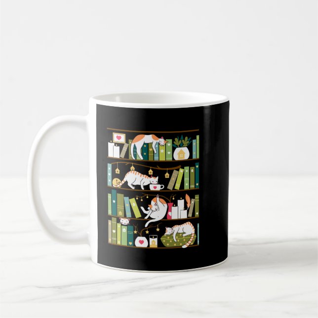 Library cats - whimsical cats on the book shelves  coffee mug (Left)