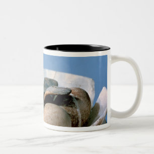 Lid of an alabaster jar decorated with a bird Two-Tone coffee mug