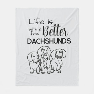 Life is better with a few Dachshunds doodle Fleece Blanket