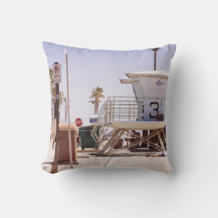 Lifeguard houses under bright skty throw pillow