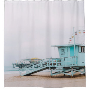 LIFEGUARD POST ON SHORE UNDER WHITE SKY