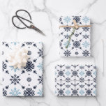 Light Blue and White Snowflake Wrapping Paper Sheet<br><div class="desc">Capture the magic of the season with our whimsical Light Blue and White Snowflake gift wrap, adorned with intricate blue and white snowflakes that dance across the pages. The design is offered in three sizes, and is a fun little touch for your Christmas, Hanukkah, or winter gifts! Look for coordinating...</div>