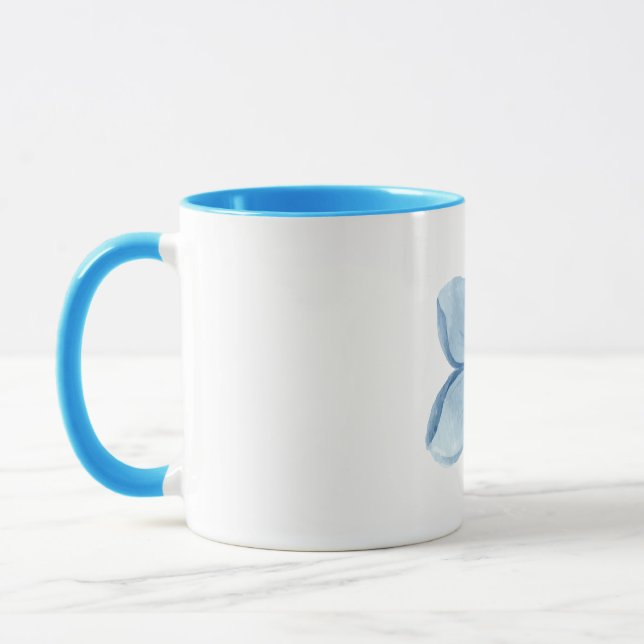 light blue flower coffee mug (Left)