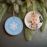 Light Blue Winter Snowflake First Christmas Photo Ceramic Ornament<br><div class="desc">Ceramic holiday ornament personalized with your baby's photo and custom "My First Christmas" text. This simple modern holiday design features a white snowflake on a light blue background. Use the design tools to choose any background colour, edit text fonts and colours and add your own photos to create your own...</div>