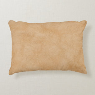 Light brown, leather texture background. accent pillow
