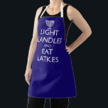 LIGHT CANDLES AND EAT LATKES APRON<br><div class="desc">Fun for Chanukah. LIGHT CANDLES AND EAT LATKES with a menorah. Design based on the 1939 British morale.</div>