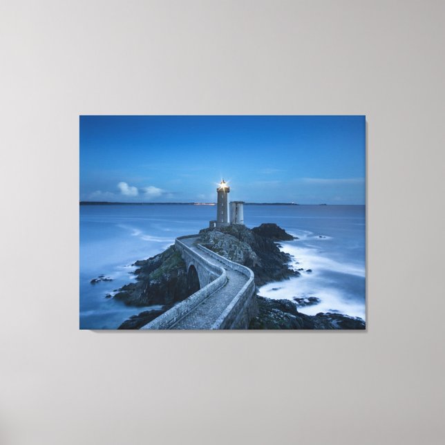light house and rocks at dusk canvas print (Front)