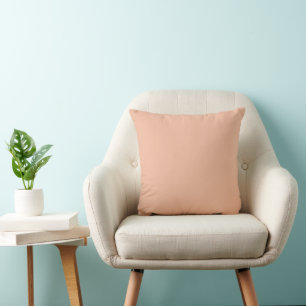 Light peach solid colour throw pillow