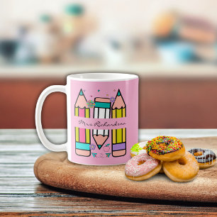 Light Pink Colourful teacher name pencil cartoon  Coffee Mug