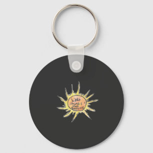 Light Shines Through Darkness Keychain