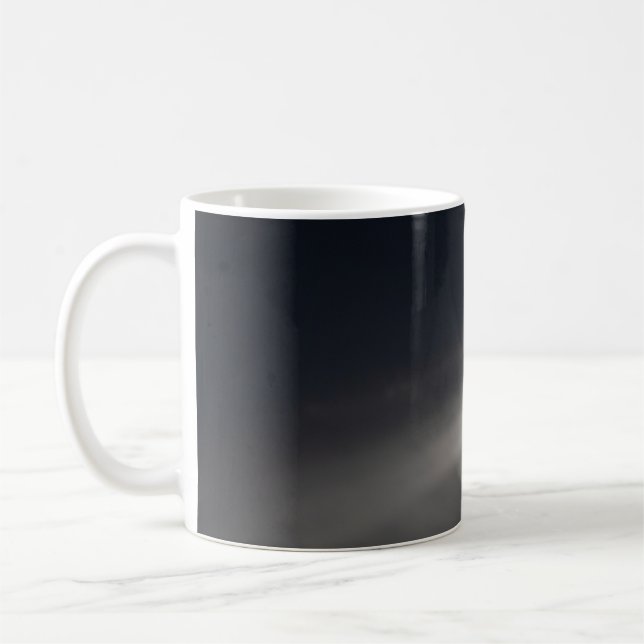 Lightbeam through the clouds  coffee mug (Left)