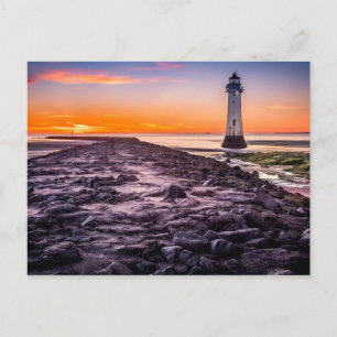 Lighthouse at sunset postcard