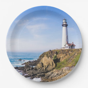 Lighthouse on hill blue sky white house ocean paper plate