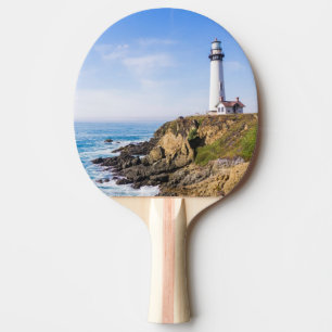 Lighthouse on hill blue sky white house ocean ping pong paddle