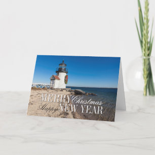 Lighthouse on the Beach with a Christmas Wreath Holiday Card