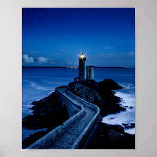 Lighthouse on wall in ocean at night poster