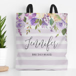 Lilac Floral and Stripes Bridesmaid Monogram Tote Bag<br><div class="desc">Custom monogrammed tote bags make the perfect gift for your bridesmaids and wedding party. This pretty design features a watercolor floral border in shades of pastel purple and green over a lavender striped background. Personalize each bag with your bridesmaids' name and add the bride and groom's initial and wedding date...</div>
