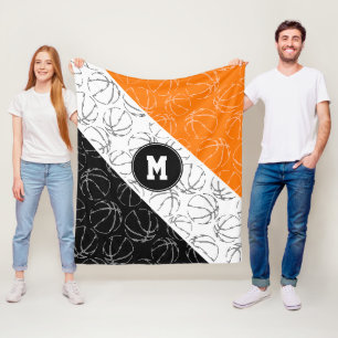 line art basketballs pattern on orange white black fleece blanket