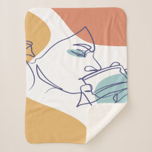 line art drawing poster of woman drinking coffee   sherpa blanket