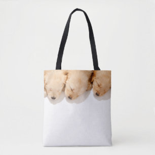Line of Sleeping Golden Retriever Puppies Tote Bag