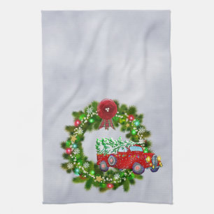 Linge De Cuisine Camion Rouge Traversant Une Guirlande De Noël