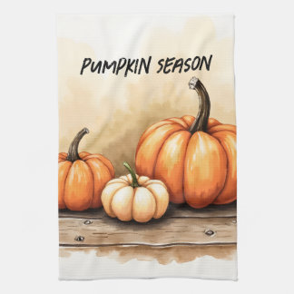 Linge De Cuisine Citrouilles d'automne sur une table en bois