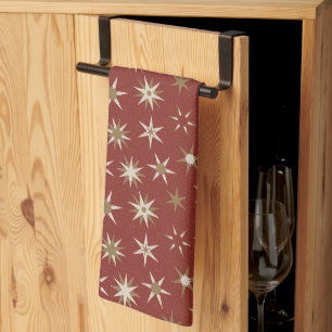 Linge De Cuisine Etoiles de Noël Gold Geo - sur motif rouge.