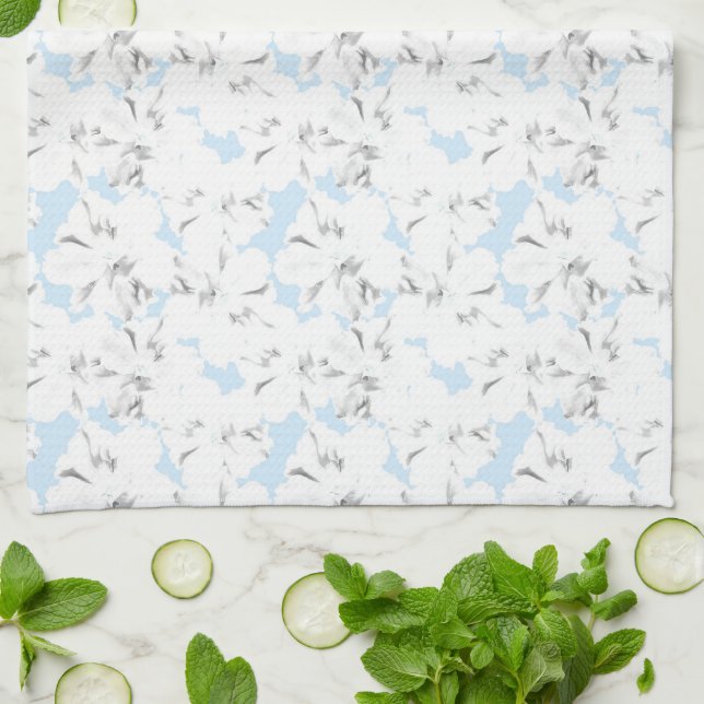 Linge De Cuisine Fleurs blanches sur bleu clair. (Plié)