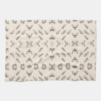 Linge De Cuisine Marble textured geometric sculptures on a beige