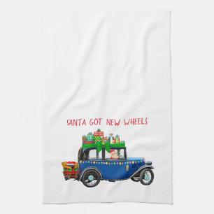 Linge De Cuisine Père Noël à bord d'une voiture