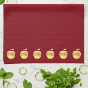 Linge De Cuisine Pommes dorées élégantes sur fond rouge