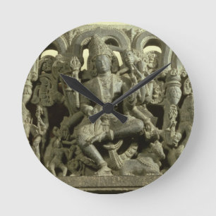 Lintel depicting The Trinity: Siva, Brahma and Vis Round Clock
