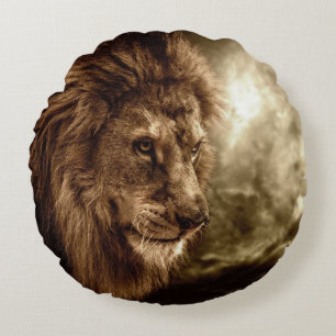 Lion against stormy sky round pillow