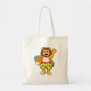 Lion as Surfer with Surfboard Tote Bag