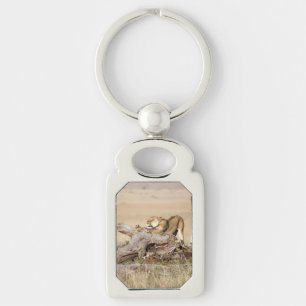 Lioness stretching keychain