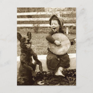 Little boy and dog, music postcard