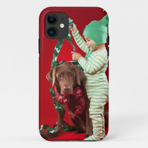 Little boy decorating a dog iPhone 11 case