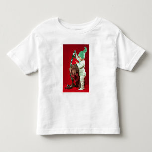 Little boy decorating a dog toddler t-shirt