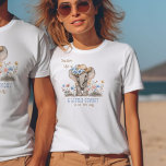 Little Cowboy Boho Elephant Baby Announcement T-Shirt<br><div class="desc">Cute boho shirt with baby elephant in a cowboy hat and lots of earthy wildflowers. The tee is lettered with "Saddle Up! A little cowboy is on the way" in western style typography and a soft blue and brown colour palette. Please browse my Boho Elephant Baby Shower collection for coordinating...</div>