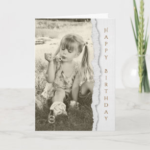 little girl blowing bubbles for birthday card